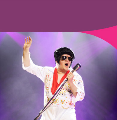 Liam performing as Elvis supported by Melba